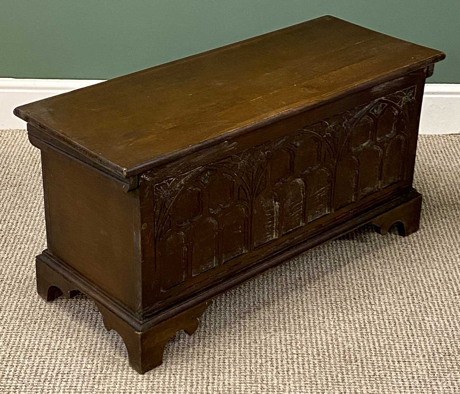 small gothic oak style blanket chest, arched carved panelled front, 47 (h) x 94 (w) x 38cms (d) small gothic oak style blanket chest, arched carved panelled front, 47 (h) x 94 (w) x 38cms (d)