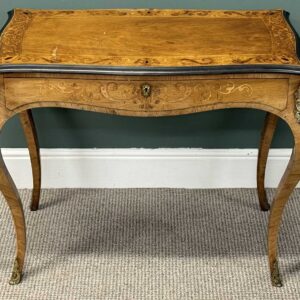 louis xv style inlaid walnut bureau plat, shaped rectangular top with ebonised rim, over a shaped