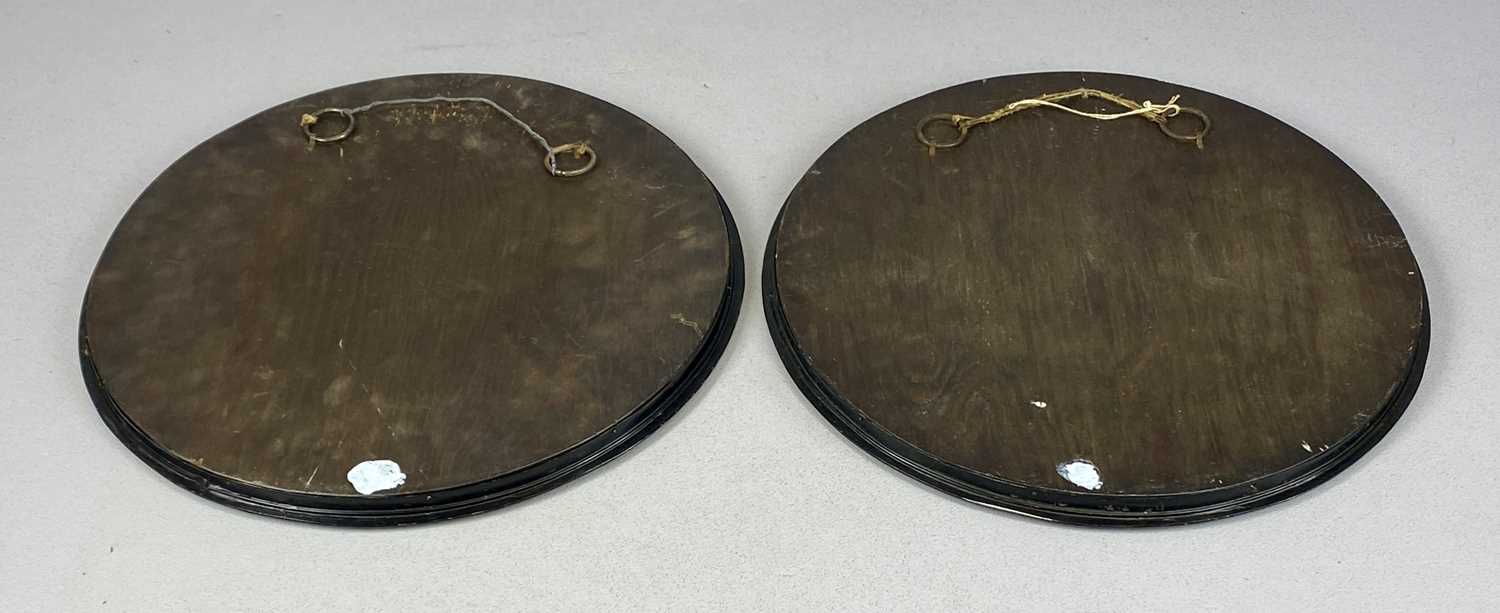 pair of vintage circular wall mirrors, with embossed copper frames and bevelled plates, 32.5cms pair of vintage circular wall mirrors, with embossed copper frames and bevelled plates, 32.5cms