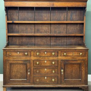 george iii oak welsh dresser, boarded plate rack back having two shelves, base having three top