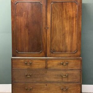 19th century mahogany press cupboard, converted to a handing cupboard, moulded dentil cornice over